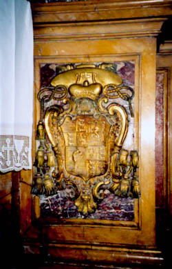 Arms of King Henry IX and I on the altar